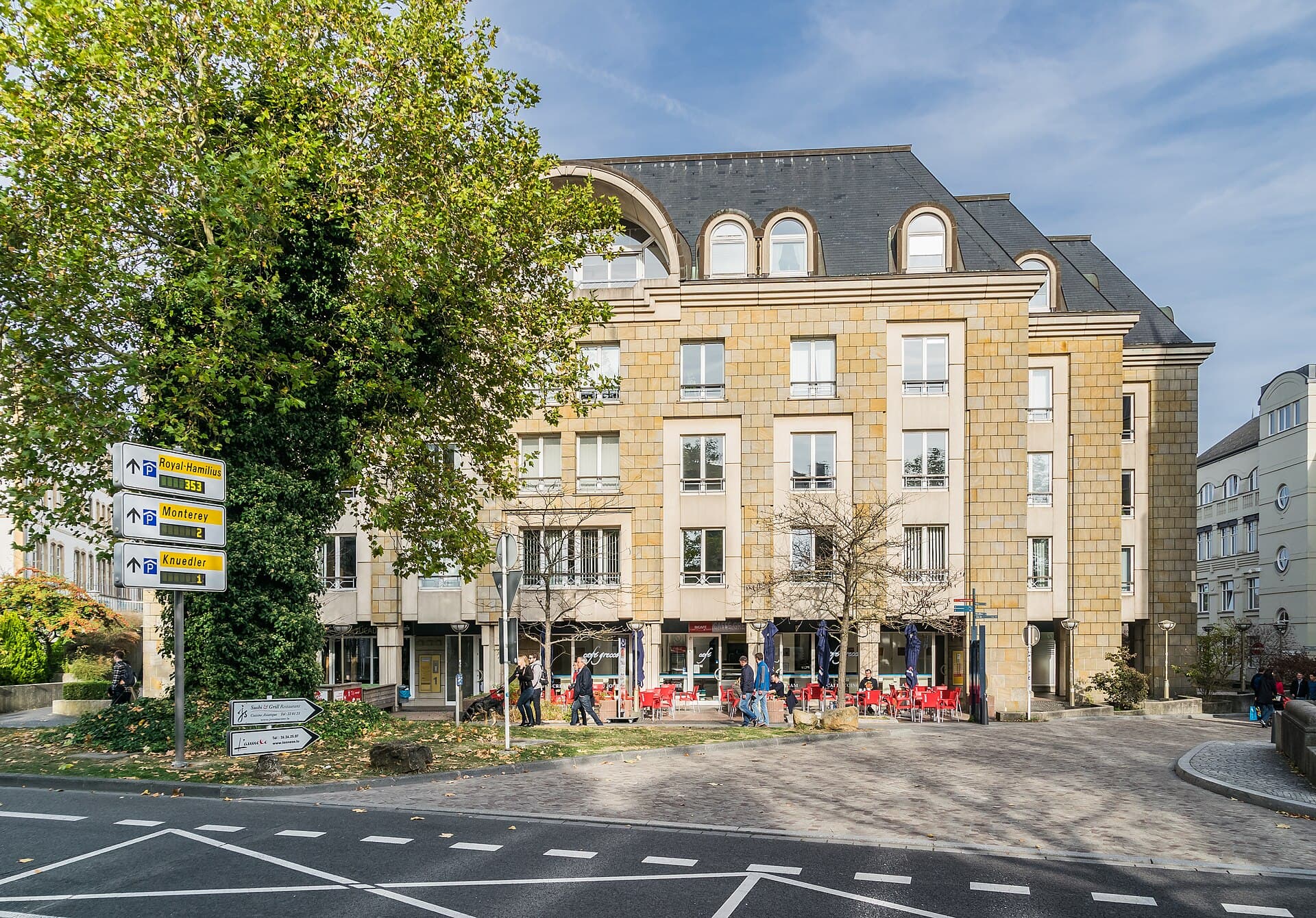 The levelled public space with its trees and paths