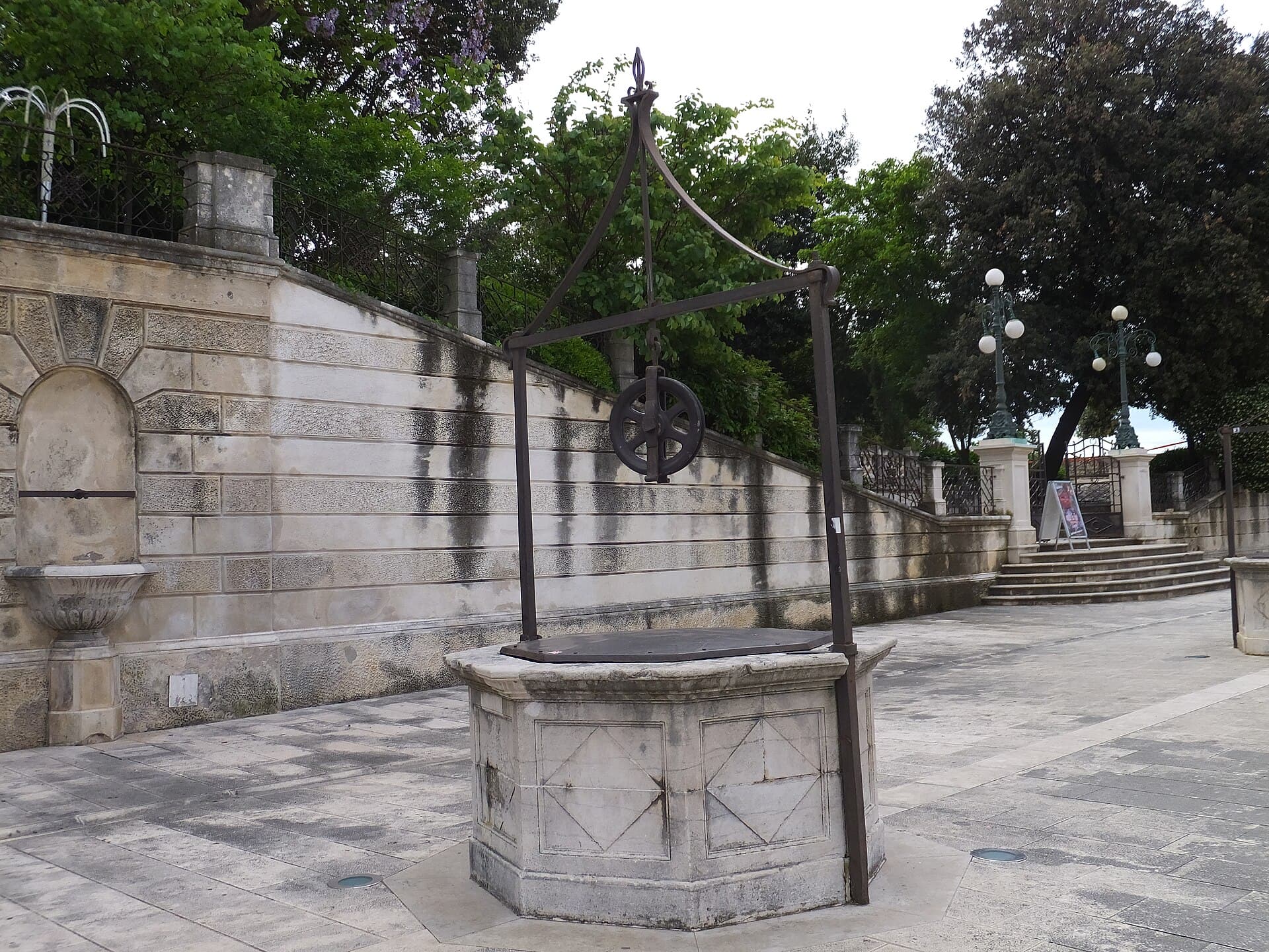 The Five Wells Square with its stone wellheads set in one line