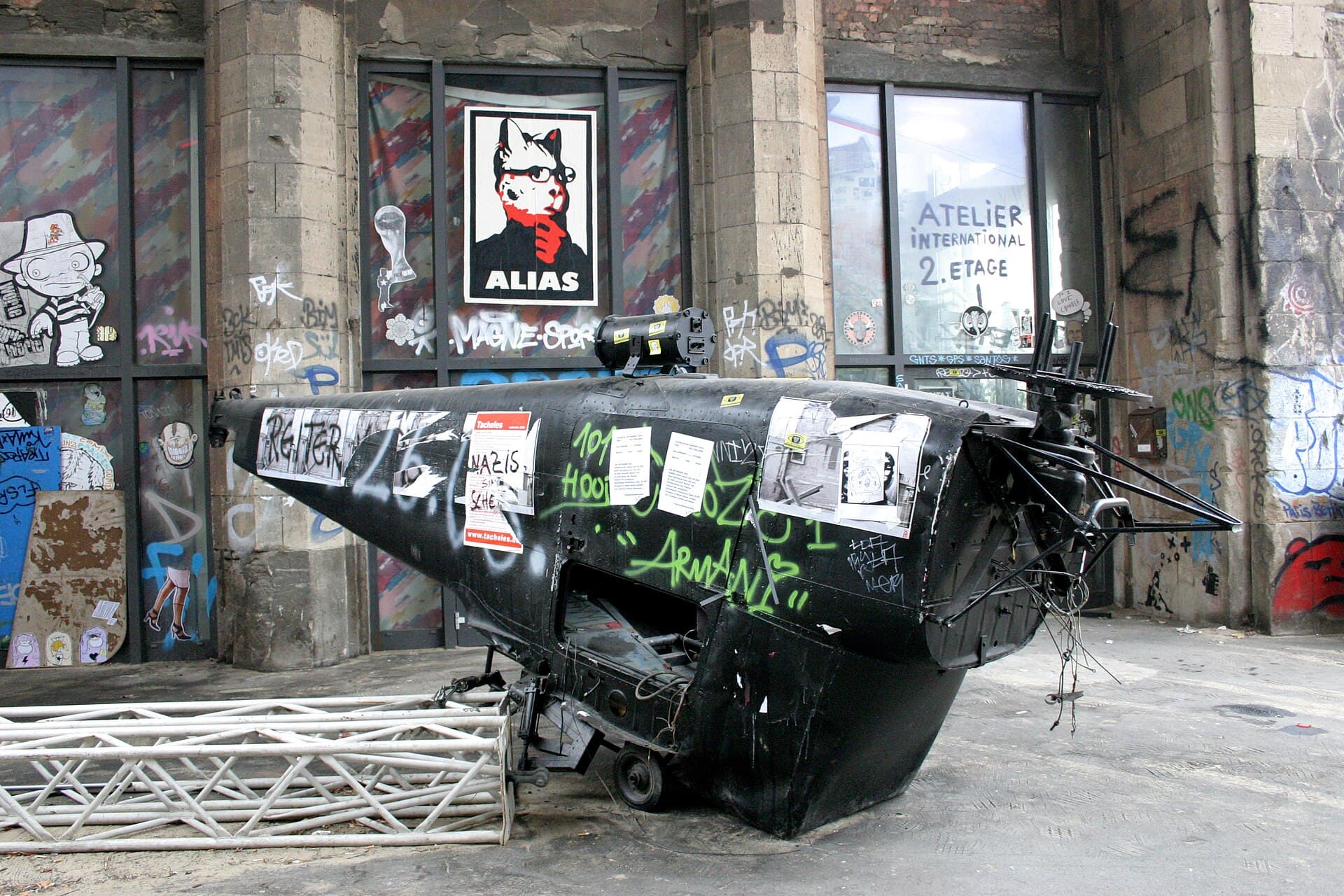 Tacheles in its squatted years, its facade painted over