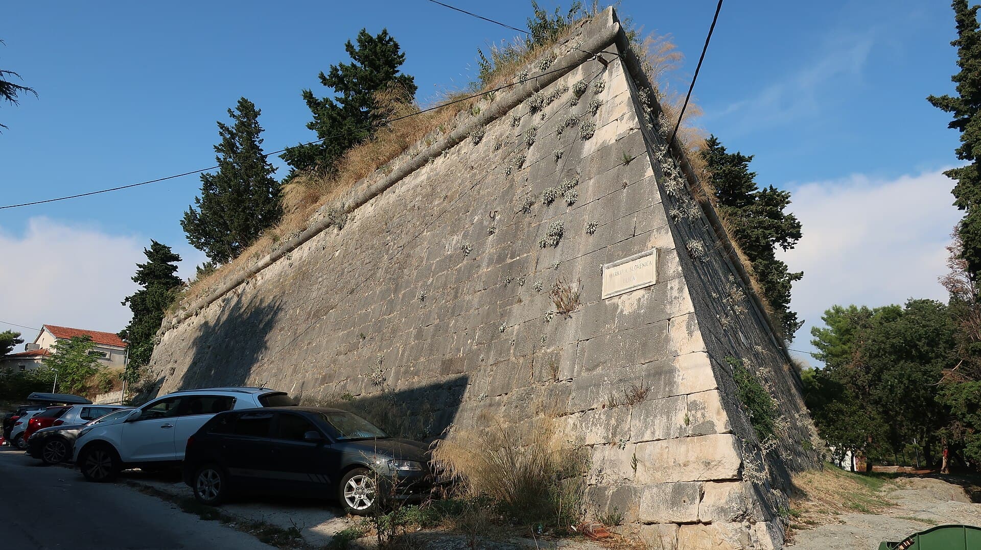 The low thick walls of Gripe fortress on the hill east of Split