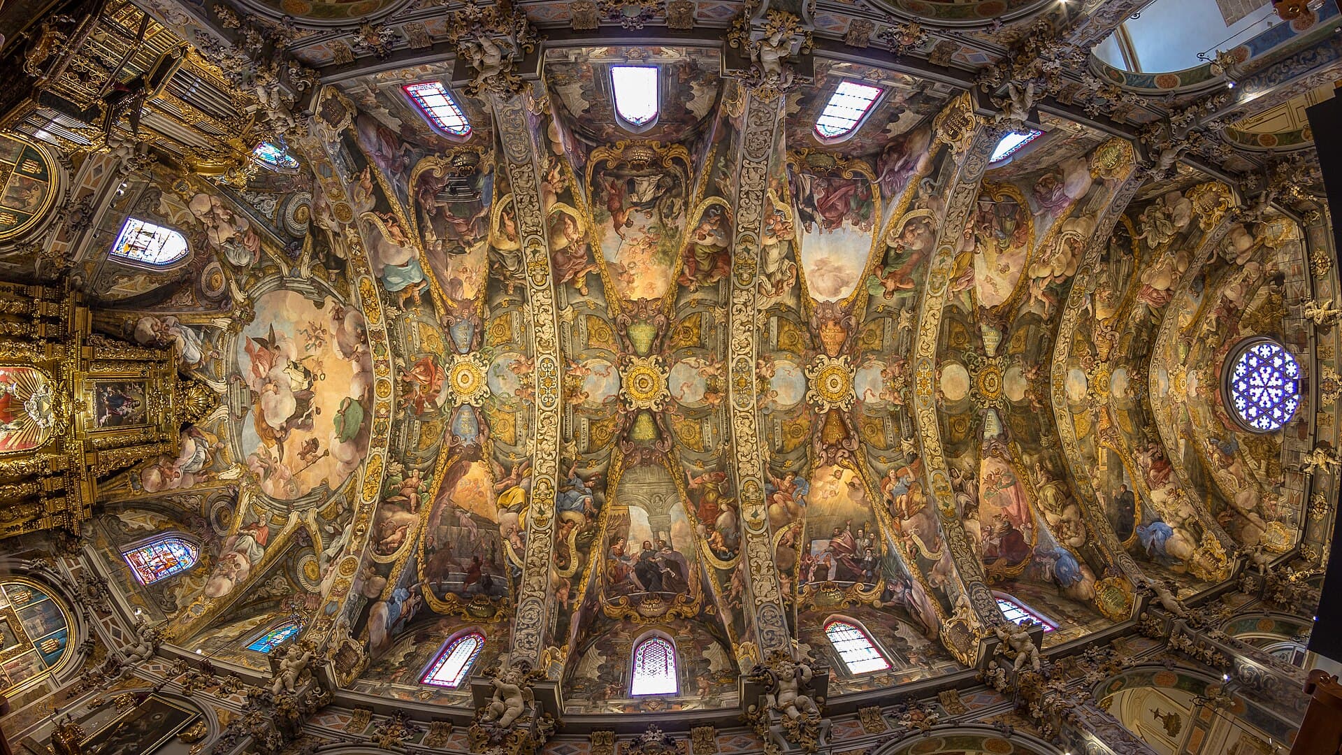 The fresco-covered ceiling of the Church of San Nicolás