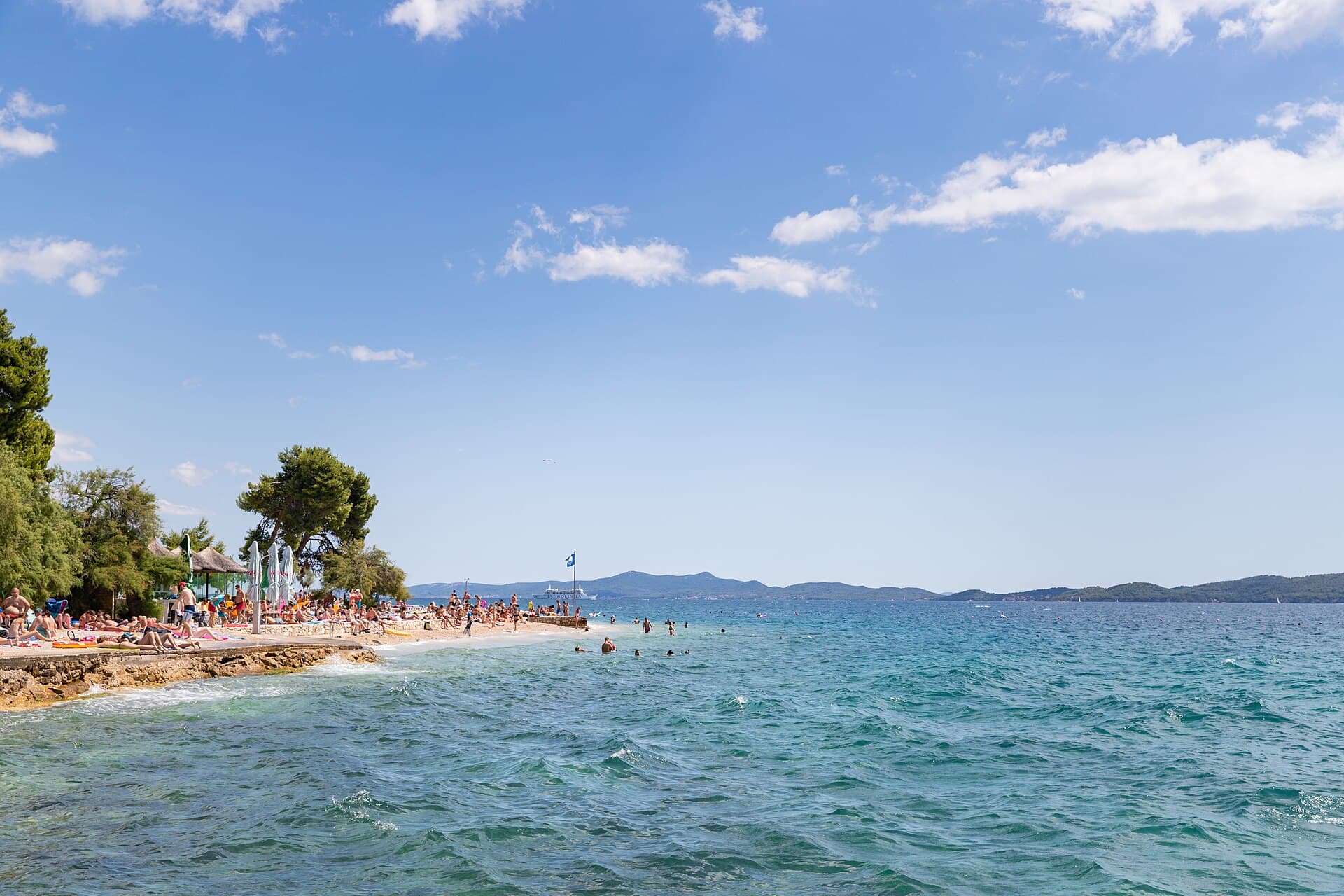 Kolovare beach and the clear Adriatic from the air