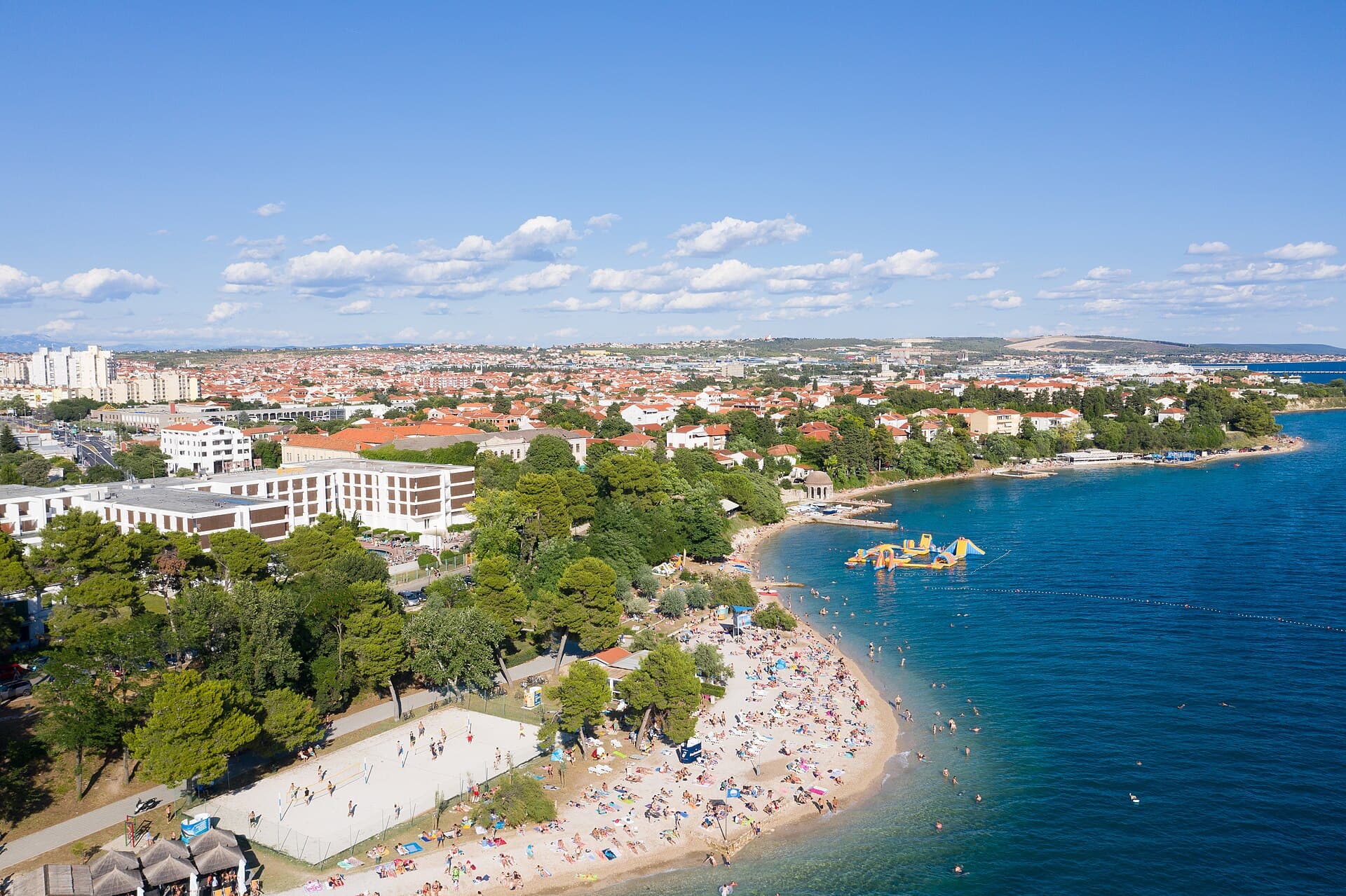 The length of the beach with its concrete platforms and shingle