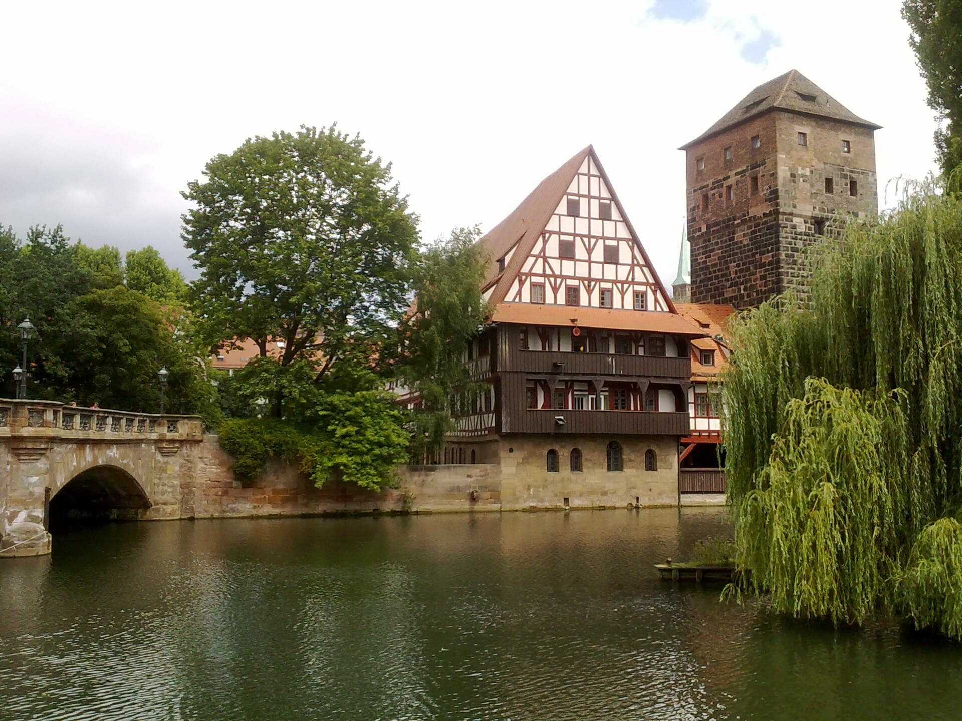Old houses on the riverbank inside the wall